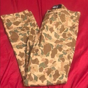 Tapered camouflage jeans.